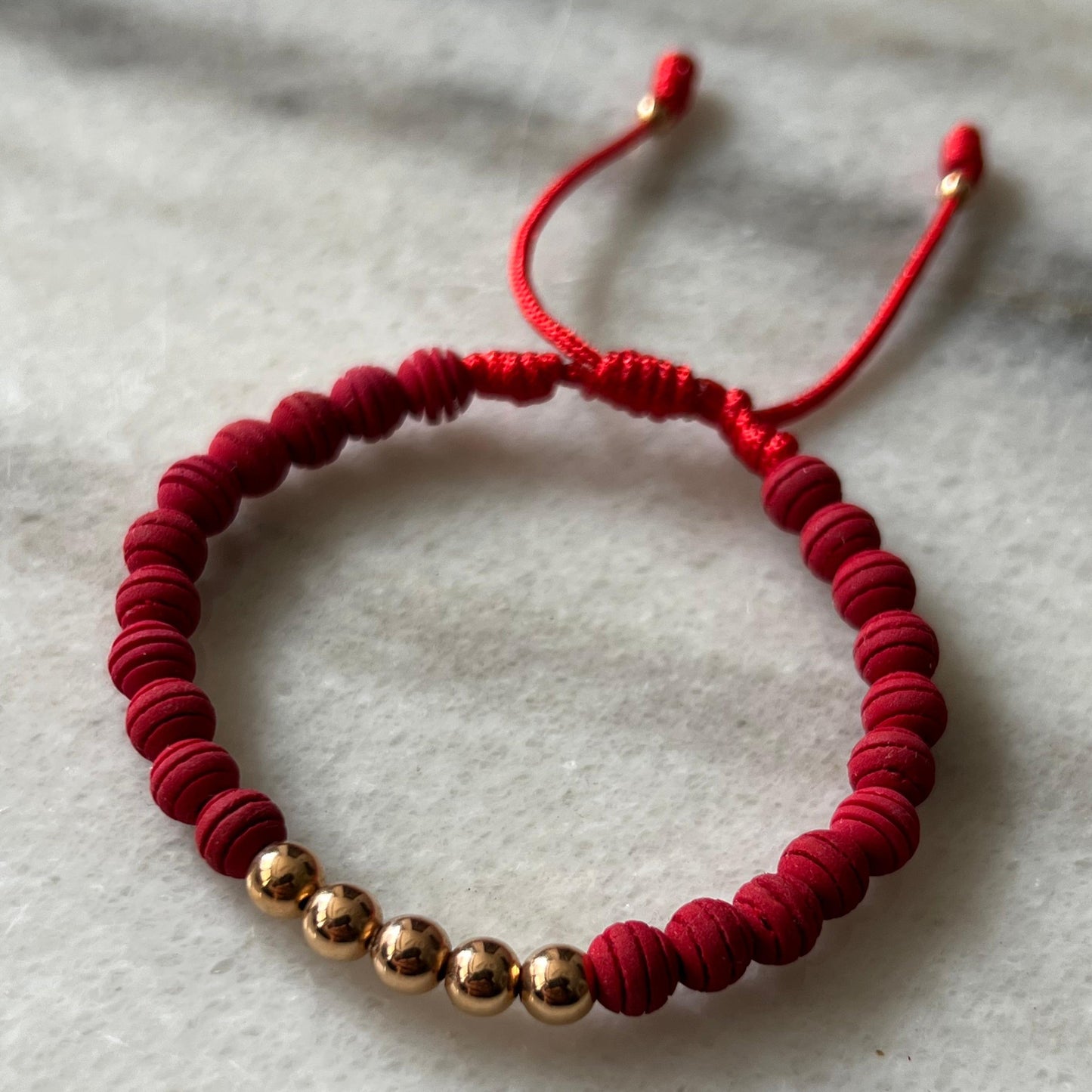 PULSERA NEOPRENOS ROJOS ORO 18K