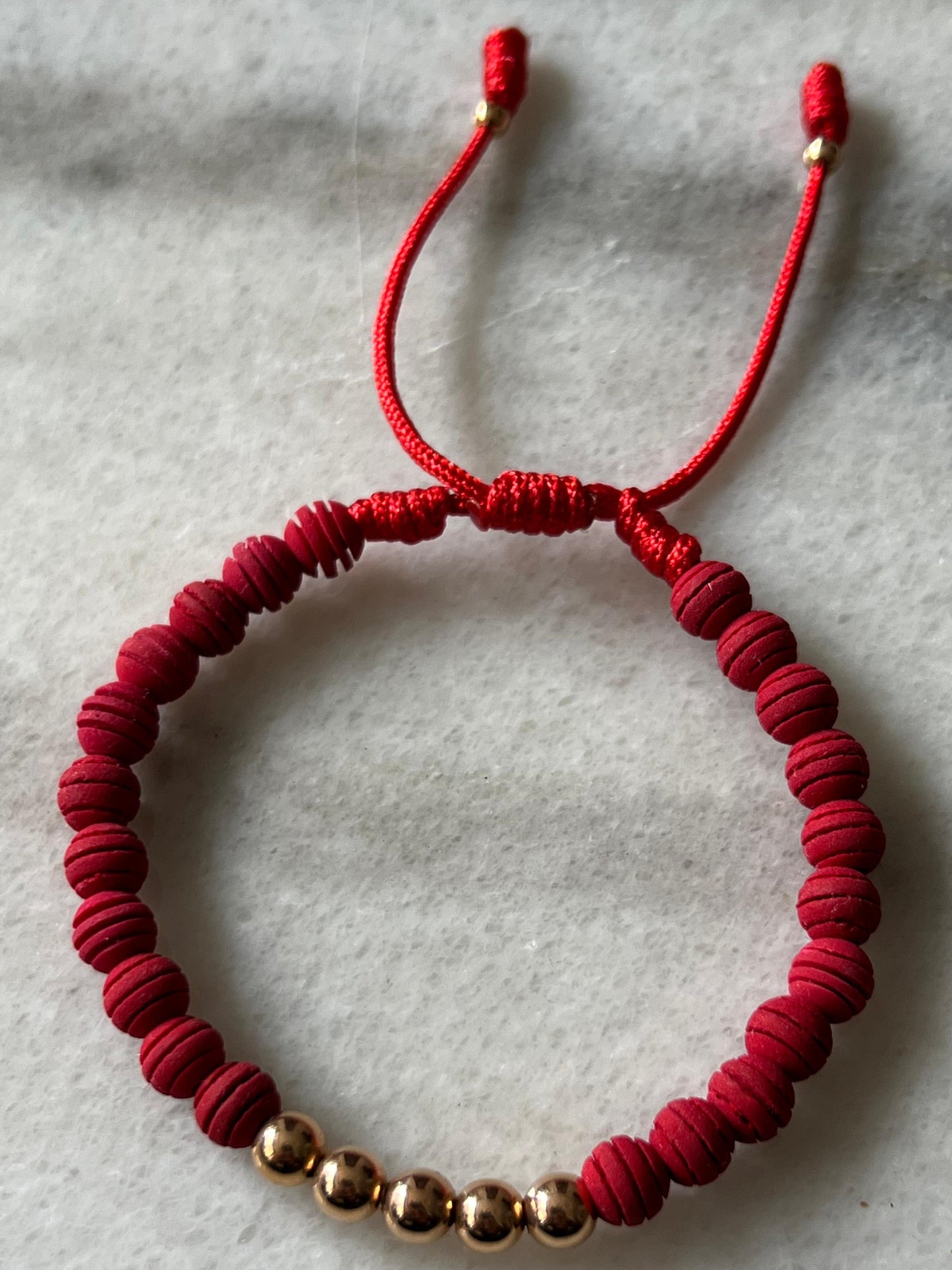 PULSERA NEOPRENOS ROJOS ORO 18K
