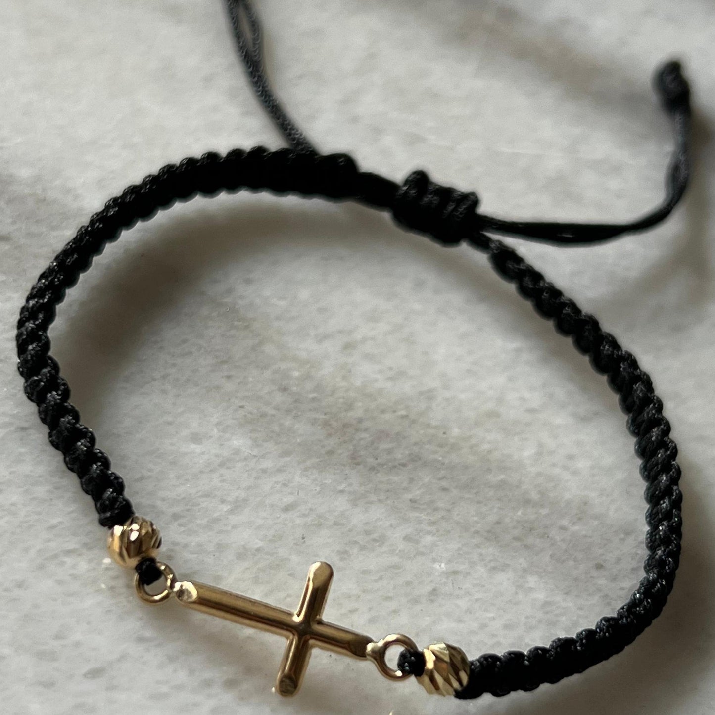 PULSERA TEJIDA CRUZ PEQUEÑA ORO 18K